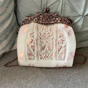 Patricia Nash white leather with antiqued metal